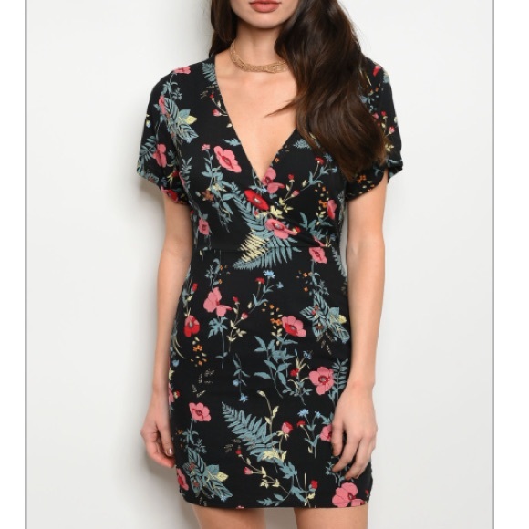 Trendy boutique Dresses & Skirts - Black floral & fern mini wrap-style dress, New!